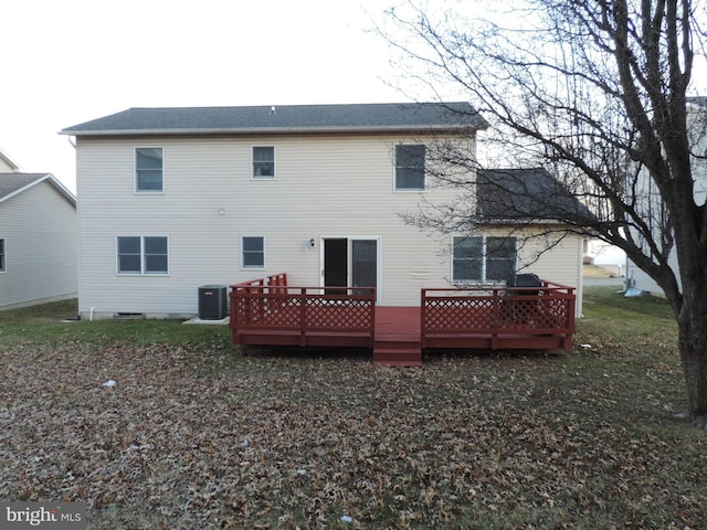 back of property featuring central AC and a wooden deck