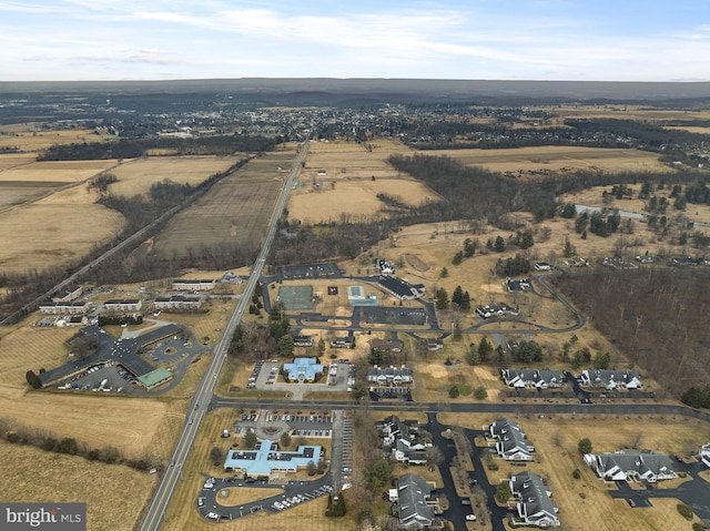 birds eye view of property featuring a rural view