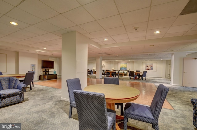 dining space with recessed lighting, baseboards, and light carpet