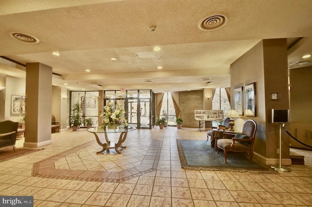 common area with stairway and visible vents