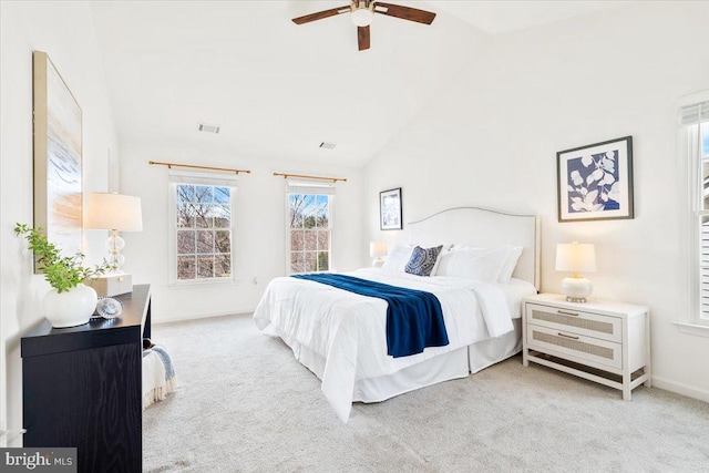 bedroom featuring visible vents, baseboards, carpet, and vaulted ceiling