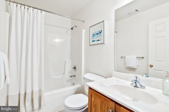 full bathroom with vanity, toilet, visible vents, and shower / tub combo with curtain