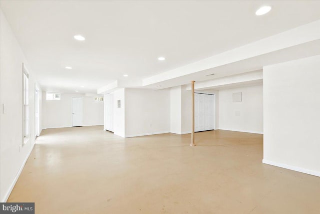 below grade area featuring recessed lighting and baseboards