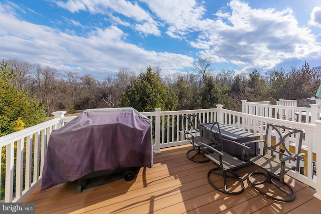 wooden terrace with grilling area