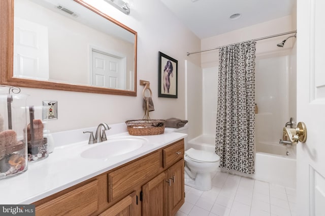 bathroom with visible vents, toilet, shower / bath combo with shower curtain, tile patterned floors, and vanity