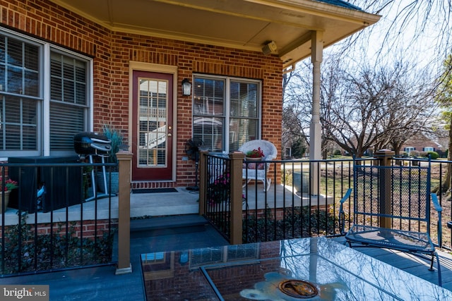 wooden deck featuring covered porch