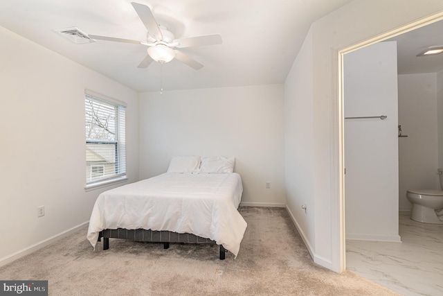 bedroom featuring marble finish floor, baseboards, visible vents, and a ceiling fan