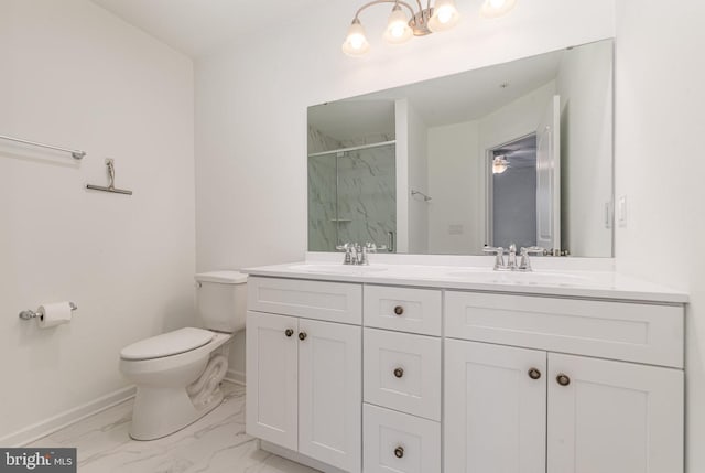 full bathroom with a marble finish shower, marble finish floor, a sink, and toilet