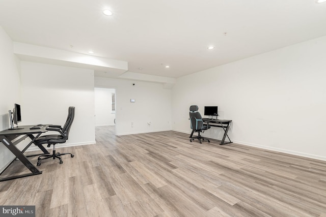 office with recessed lighting, light wood-style flooring, and baseboards