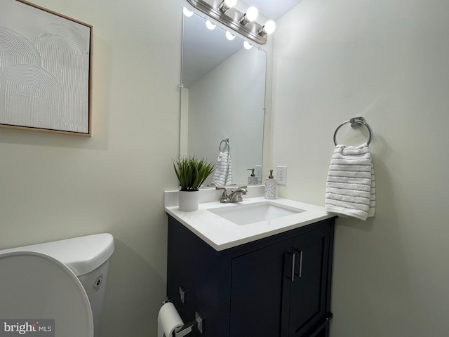 half bath with toilet and vanity