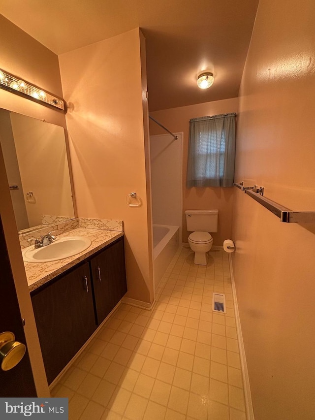 bathroom featuring tile patterned flooring, toilet, vanity, visible vents, and washtub / shower combination