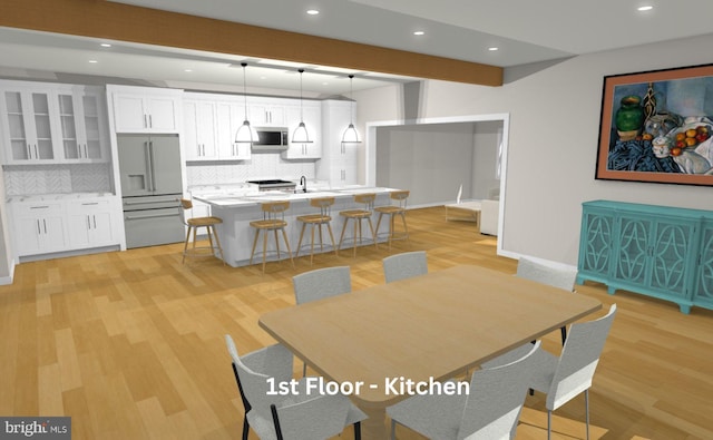 dining space with baseboards, recessed lighting, beam ceiling, and light wood-style floors