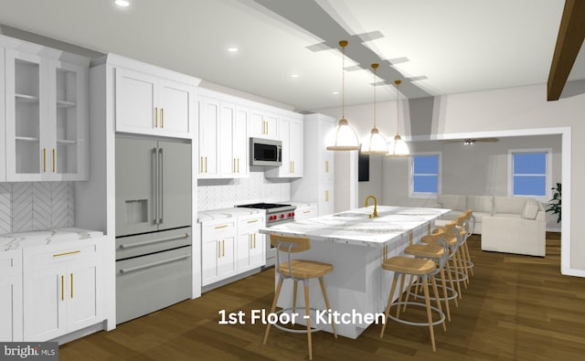 kitchen featuring dark wood-style flooring, white cabinets, a sink, and built in appliances