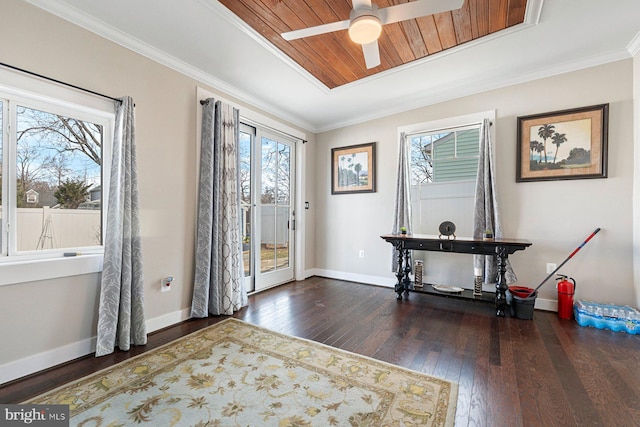 entryway featuring hardwood / wood-style flooring, wood ceiling, baseboards, and ornamental molding