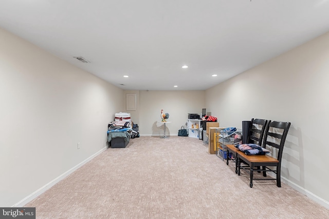 interior space with recessed lighting, visible vents, light colored carpet, and baseboards