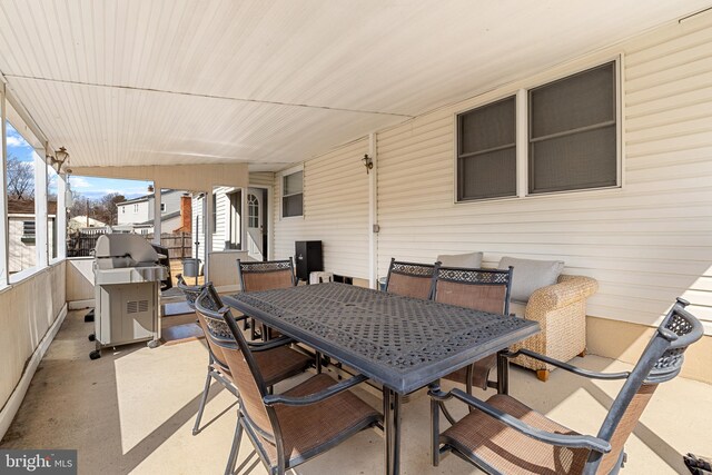 view of patio featuring outdoor dining space and grilling area