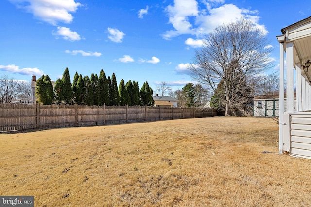 view of yard featuring a fenced backyard