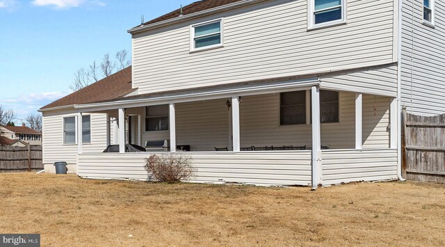 exterior space with a yard and fence