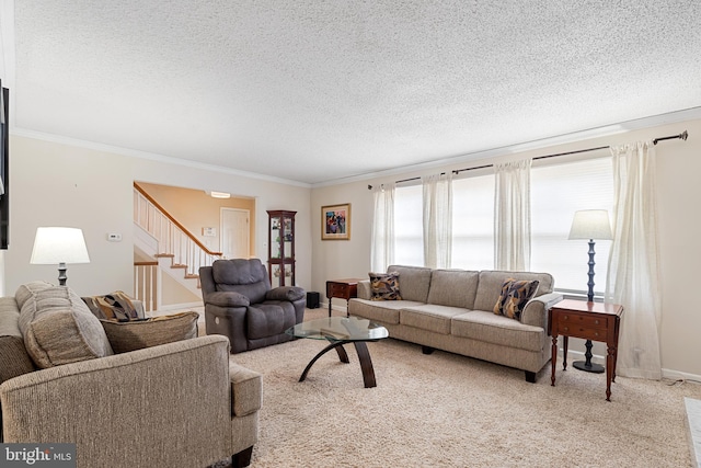 living room featuring stairway, carpet, crown molding, and a textured ceiling