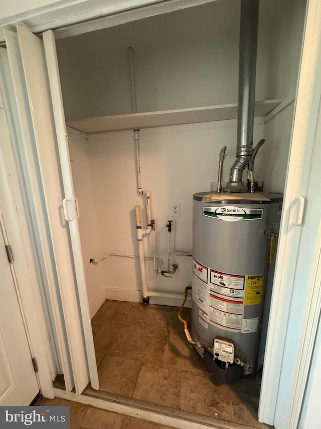 utility room with water heater