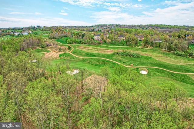 bird's eye view with view of golf course