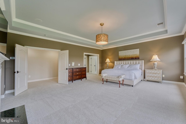 bedroom with ornamental molding, a tray ceiling, visible vents, and carpet floors