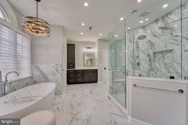 full bathroom with vanity, visible vents, recessed lighting, marble finish floor, and a marble finish shower