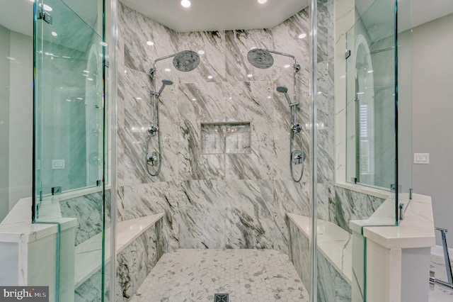 full bathroom with recessed lighting and a marble finish shower