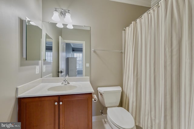 full bath featuring toilet and vanity