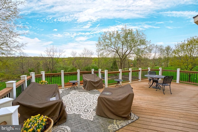 wooden deck with area for grilling