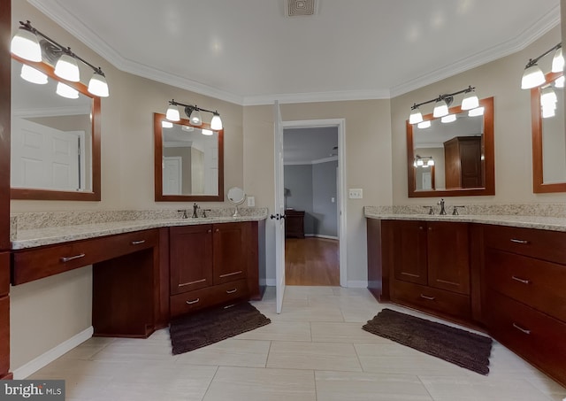 full bathroom featuring ornamental molding, two vanities, a sink, and visible vents