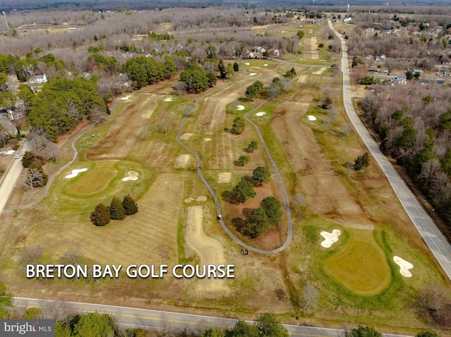 birds eye view of property with golf course view