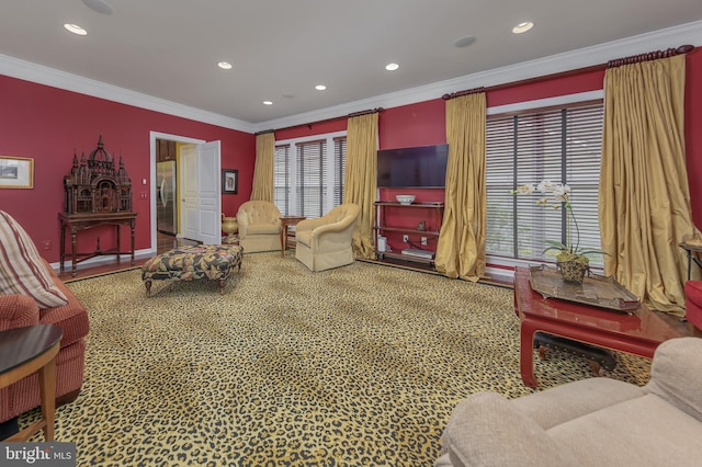 living room featuring ornamental molding and recessed lighting