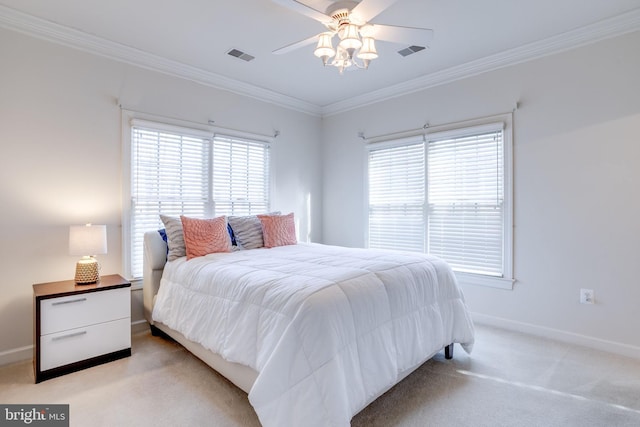 bedroom with baseboards, light carpet, visible vents, and crown molding