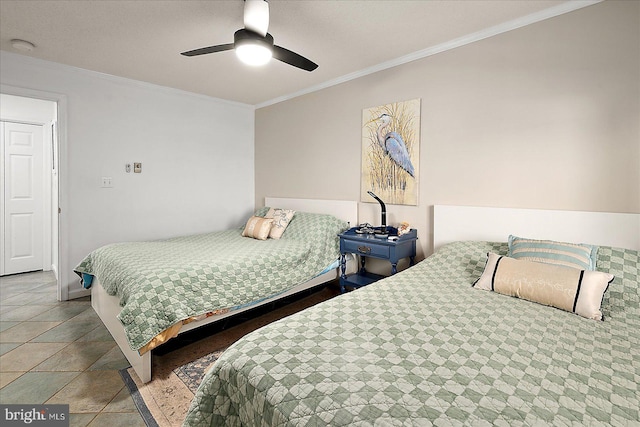 bedroom with ceiling fan and crown molding