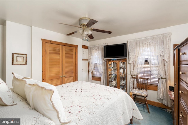 bedroom featuring carpet floors, a closet, and a ceiling fan