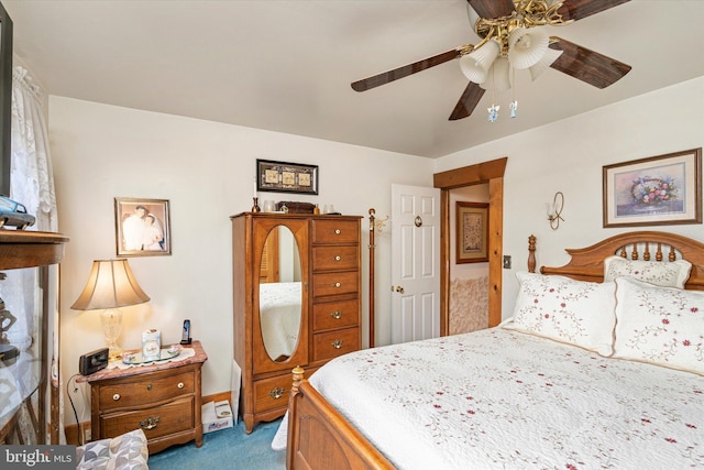 bedroom with light carpet, ceiling fan, and baseboards