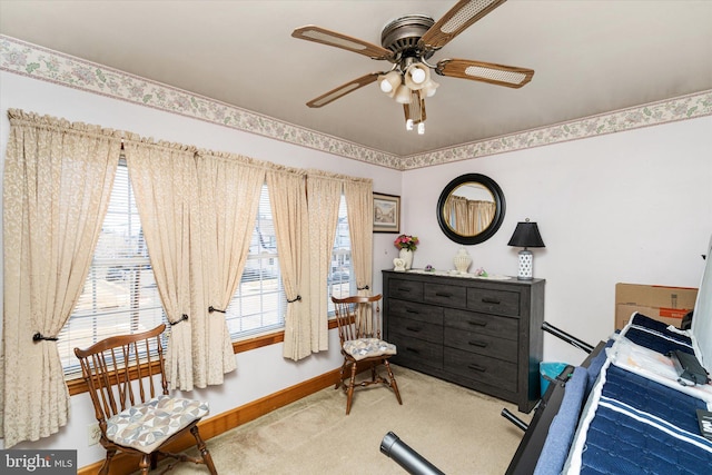 bedroom with baseboards and carpet flooring