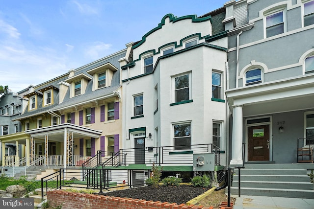 view of property with a residential view