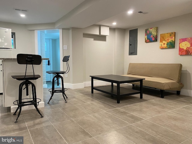 interior space featuring visible vents, baseboards, electric panel, and recessed lighting