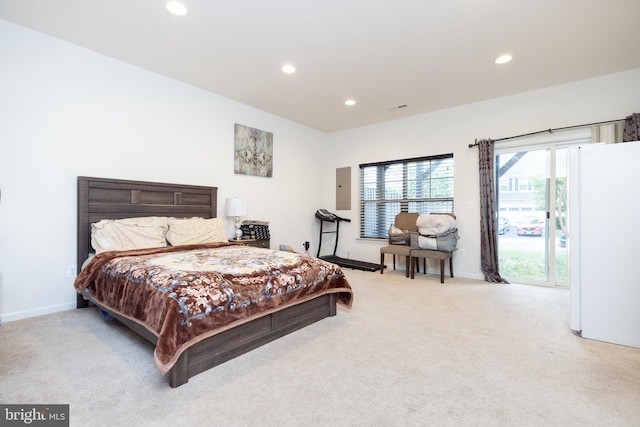 carpeted bedroom featuring access to exterior, freestanding refrigerator, electric panel, and recessed lighting