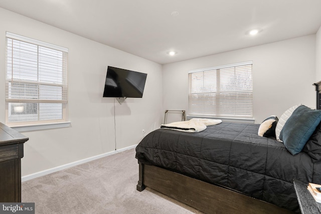 carpeted bedroom with recessed lighting and baseboards