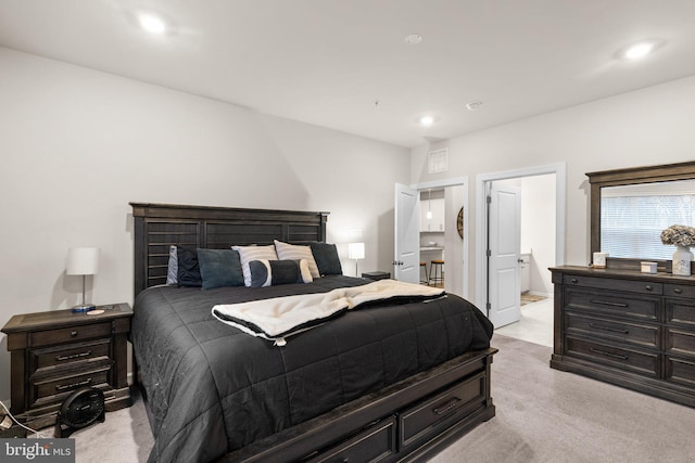 bedroom featuring recessed lighting and light colored carpet