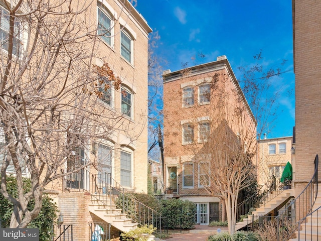 view of building exterior featuring stairway