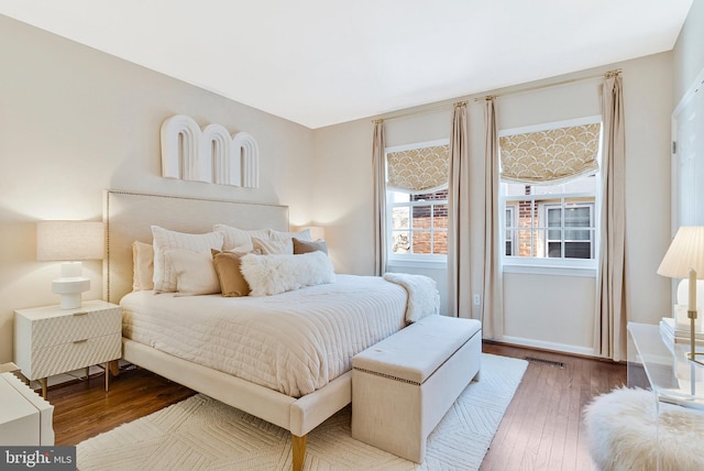 bedroom featuring hardwood / wood-style floors