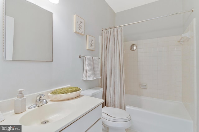 full bathroom featuring toilet, shower / tub combo, and vanity