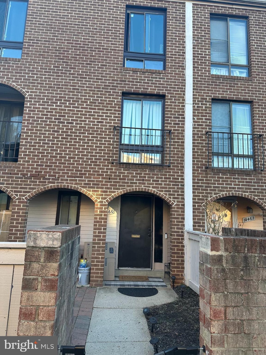 property entrance with brick siding