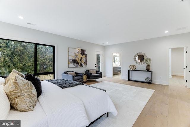 bedroom featuring recessed lighting, visible vents, and light wood-style flooring