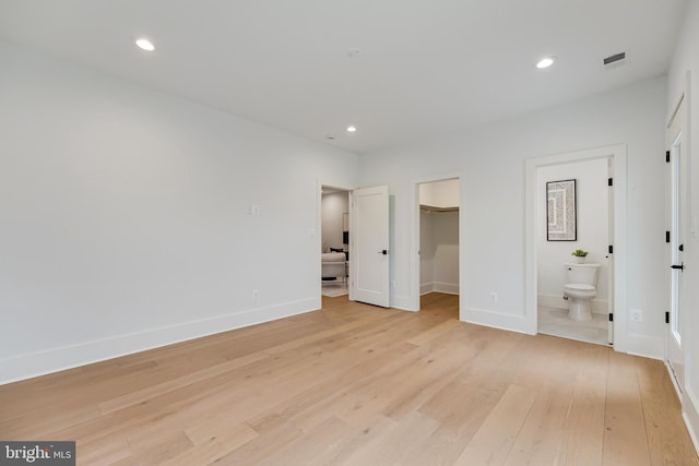 unfurnished bedroom with recessed lighting, baseboards, visible vents, and light wood finished floors