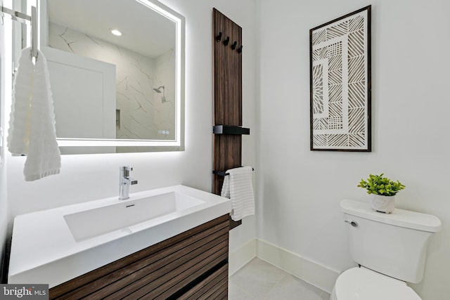 bathroom featuring recessed lighting, baseboards, vanity, and toilet